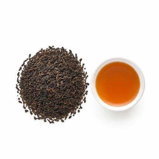 Illustrative Nilgiri Orthodox BOP loose tea and cup on white